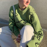 Suéter holgado extragrande con estampado de dinosaurios